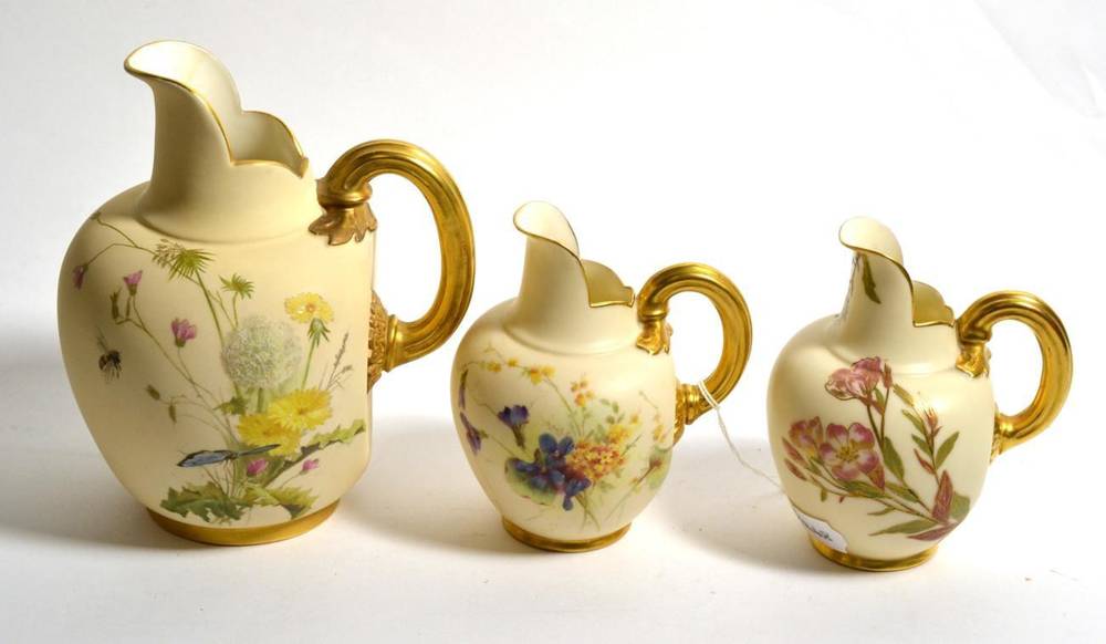 Lot 161 - Three Royal Worcester blush ivory jugs decorated with floral sprays, each pattern number 1094