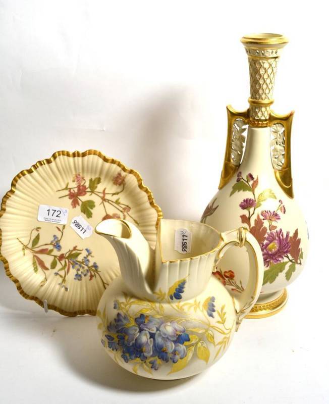 Lot 172 - A Royal Worcester blush ivory twin handled bottle vase, together with a similar jug and plate (3)