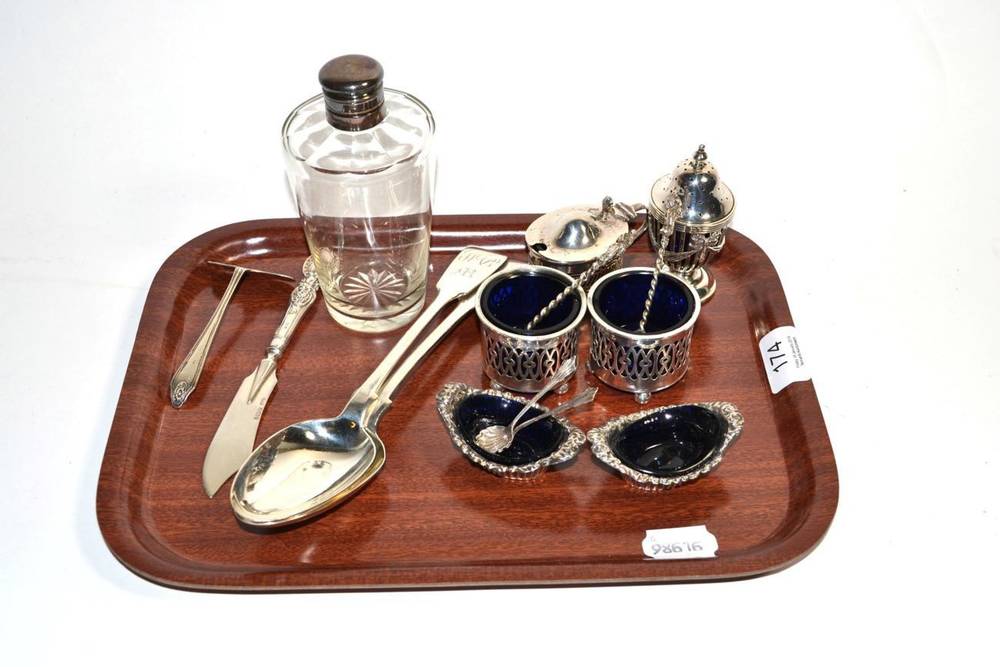 Lot 174 - A small group of Victorian silver including a pair of tablespoons; a butter knife; a pair of...