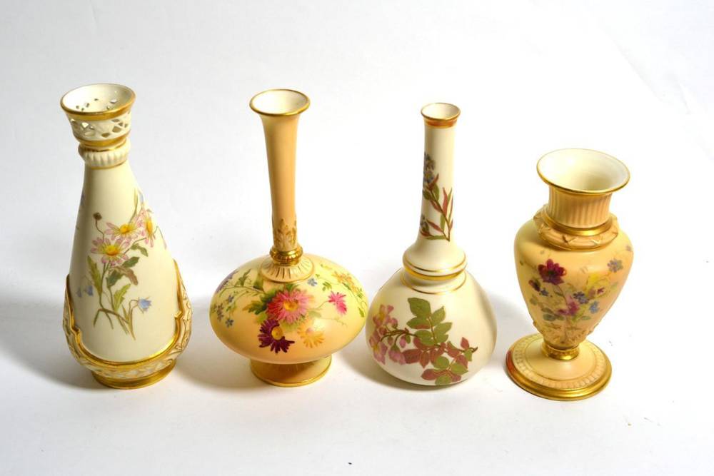 Lot 180 - Four Royal Worcester blush ivory vases decorated with floral sprays, one with a pierced rim,...