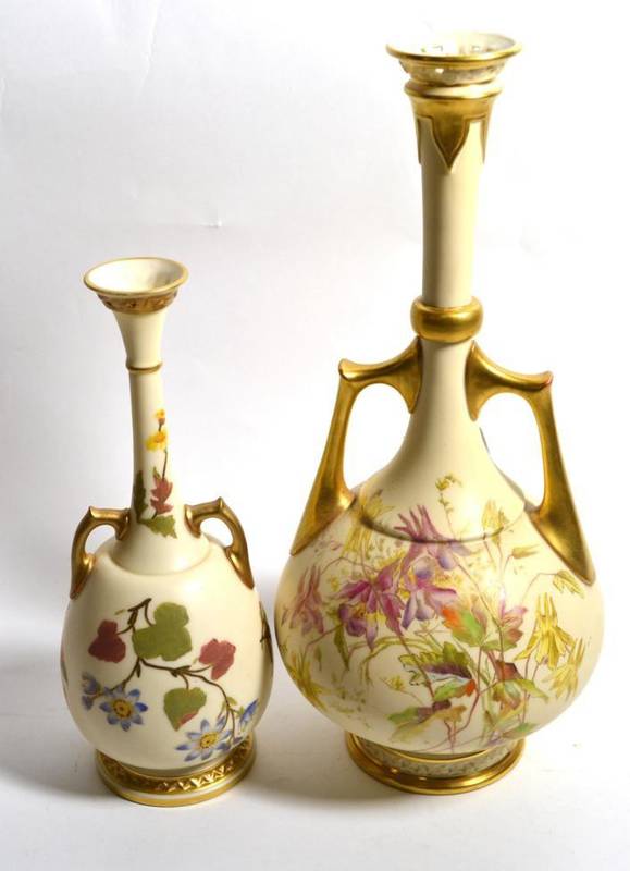 Lot 185 - A Royal Worcester blush ivory twin handled bottle vase with pierced rim and decorated with...