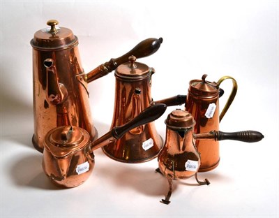 Lot 208 - Four various copper hot chocolate pots, each with turned wooden handle, 19th century and later;...