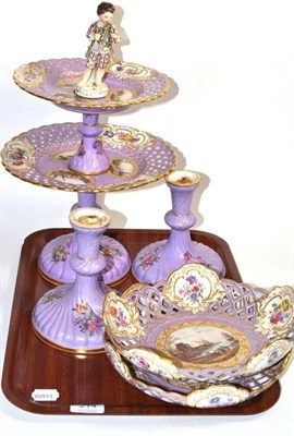 Lot 214 - A 19th century continental gilt highlighted and purple ground two tier cake stand, decorated...