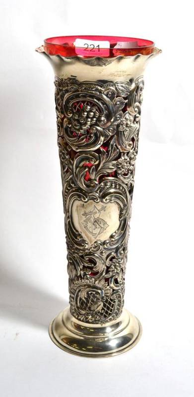 Lot 221 - A large Victorian silver sleeve vase, London 1892, with pierced and repousse decoration of...
