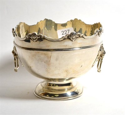 Lot 227 - An Edwardian twin handled silver pedestal rose bowl, William Hutton, Birmingham 1907, with lion...