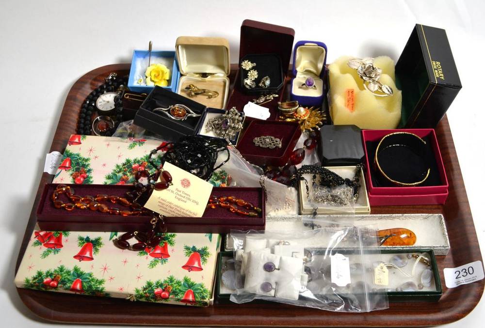 Lot 230 - A selection of costume jewellery including Bakelite bead necklaces, Scottish silver brooch,...