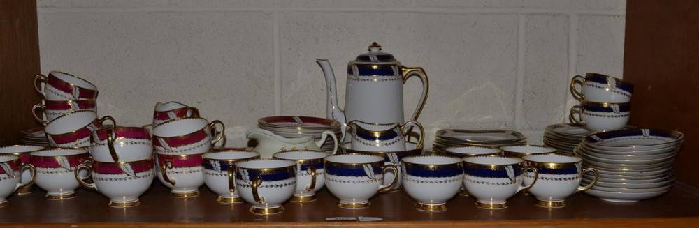 Lot 292 - A Royal Albert Crown china tea service, 12 settings, with red and gilt boarders; another part...