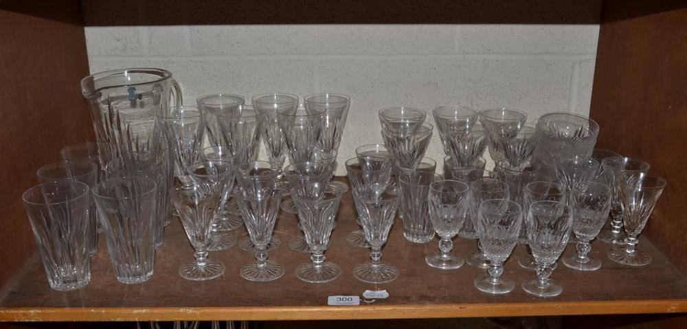 Lot 300 - A part suite of Waterford glass including white and red wines, lemonade jug and tumblers,...