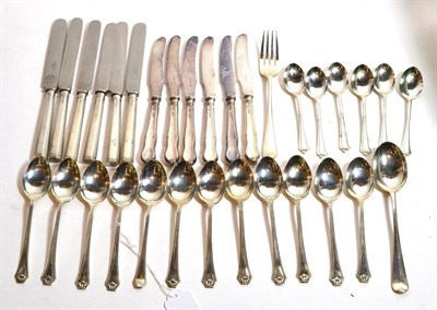 Lot 313 - A set of 12 silver bead edge teaspoons, Birmingham 1928-32; and a set of six coffee spoons,...