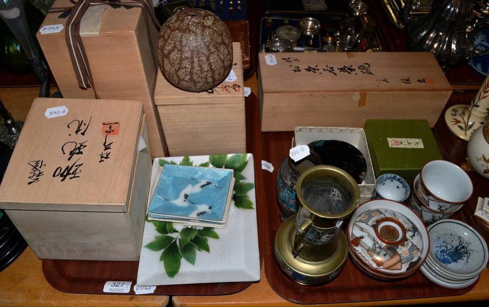 Lot 327 - Japanese ceramics comprising four Studio items in wooden boxes; six black plates; two blue and...