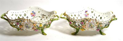 Lot 335 - A pair of Meissen floral baskets, painted with small vignettes of birds (one a.f)