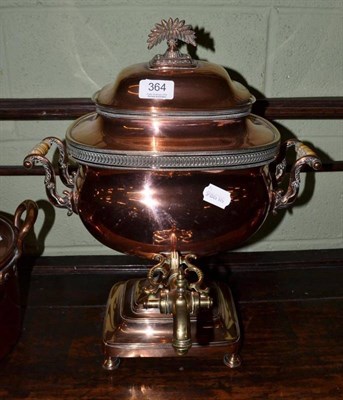 Lot 364 - A late 19th century copper and brass tea urn with turned ivory handles