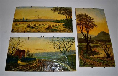 Lot 372 - Three Victorian hand-painted landscape tiles, in the style of Atkinson Grimshaw, incised...