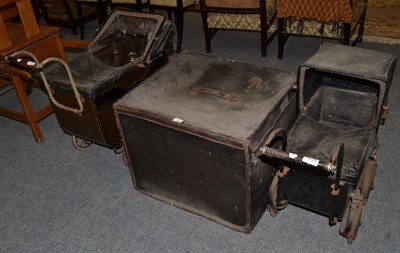 Lot 1126 - A leather trunk, together with two Victorian dolls prams (3)