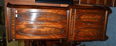 Lot 1143 - A mahogany reproduction pedestal desk; a standing corner cabinet with keys; and a mahogany...