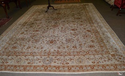 Lot 1163 - Kashan Carpet, Central Iran, circa 1940, the cream field of scrolling vines and palmettes...