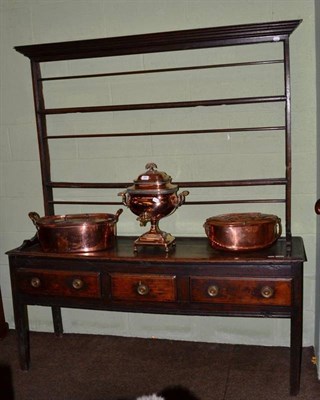 Lot 1168 - An 18th century and later oak dresser and rack