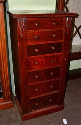 Lot 1171 - A Victorian mahogany wellington chest, the seven drawers above a platform base, 52cm wide