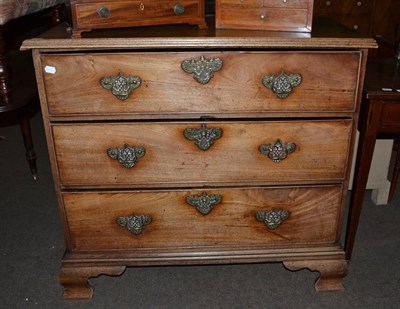 Lot 1199 - A chest on chest, the upper section now with an associated stand, the lower section with later top