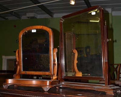 Lot 1200 - A Victorian mahogany toilet mirror with serpentine shaped platform base and a George III style...