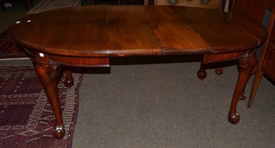 Lot 1205 - A late 19th/early 20th century extending dining table, with two small additional leaves, 180cm...