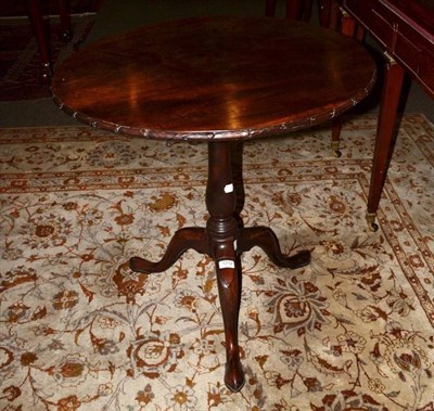 Lot 1212 - A George III style tripod table