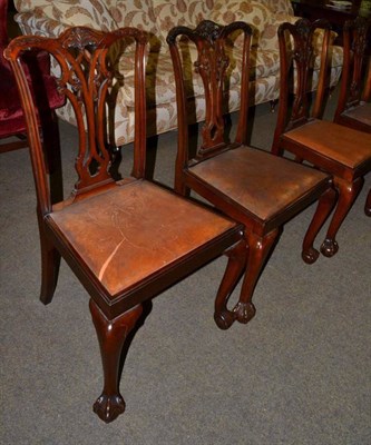 Lot 1221 - A set of six mahogany dining chairs, circa 1900, with later drop in seats, including one carver