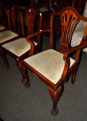 Lot 1231 - A set of six early 20th century dining chairs, including two carvers, onball and claw feet