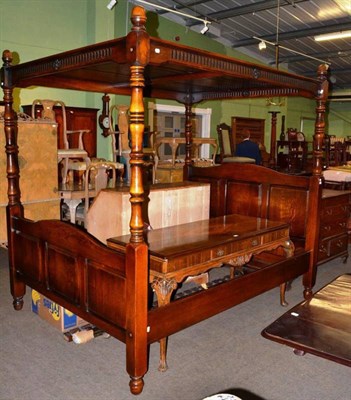 Lot 1248 - A reproduction oak four poster bed, canopy top with moulded panels, takes a 5ft mattress,...