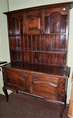 Lot 1267 - A late 19th/early 20th century oak dresser and rack