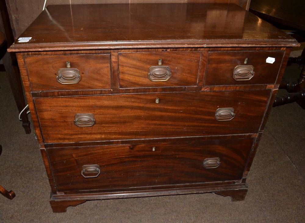 Lot 1276 - A George III mahogany three height chest of drawers
