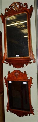 Lot 1278 - A walnut and parcel gilt pier glass in the George II style and a 1920s walnut mirror with shell...