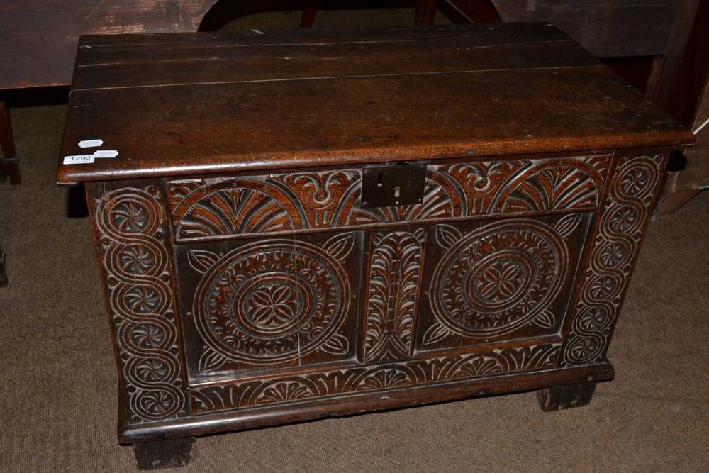 Lot 1292 - A carved oak kist