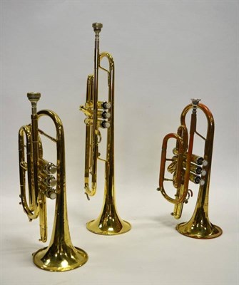 Lot 2018 - Trumpet engraved Elkhart Series II, no.66059 (cased with mouthpiece) together with two Cornets...