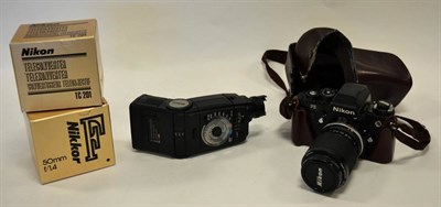 Lot 2141 - Nikon F3 Camera no.1656068, with Nikkor f3.5-4.5 35-105mm lens in manufacturers leather case,...