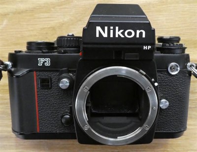 Lot 2141 - Nikon F3 Camera no.1656068, with Nikkor f3.5-4.5 35-105mm lens in manufacturers leather case,...