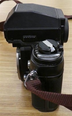 Lot 2141 - Nikon F3 Camera no.1656068, with Nikkor f3.5-4.5 35-105mm lens in manufacturers leather case,...