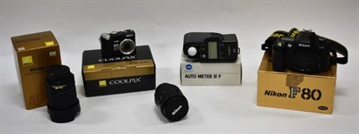 Lot 2142 - Nikon F80 Camera Body no.2172867, together with Nikkor AF-S DX f3.5-5.6 18-135mm lens (both in...