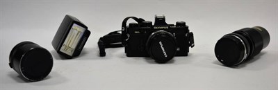 Lot 2145 - Olympus OM2N Camera with Zuiko MC Auto-S f1.8 50mm lens; with additional Zuiko S Auto-Zoom f5...