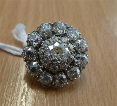 Lot 214 - A Diamond Brooch/Pendant, circa 1880, an old cut diamond cluster within a border of old cut...