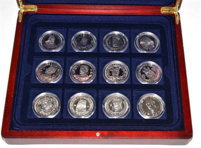 Lot 105 - A collection of 24 silver proof Crown-sized medals portraying various monarchs of England in a...