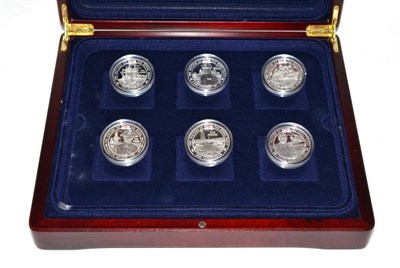 Lot 106 - The History of the Royal Navy 2003-2005, an 18-coin collection of silver proof crown-sized...