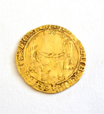 Lot 135 - Henry VIII (1509-1547), Half Sovereign, third coinage, Tower mint, king enthroned holding orb...