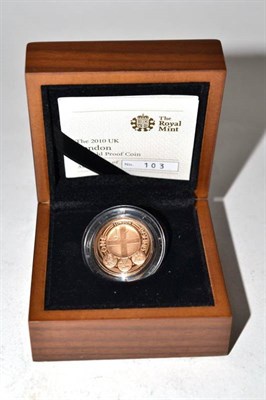 Lot 209 - Elizabeth II (1952-), proof £1 struck in gold, 2010 London badge (950 issued), in Royal Mint...