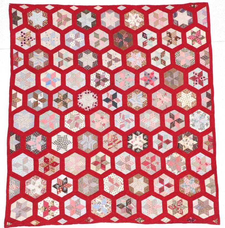 Lot 2001 - Late 19th Century Patchwork Star Quilt, within turkey red cotton borders, cream reverse, 226cm...