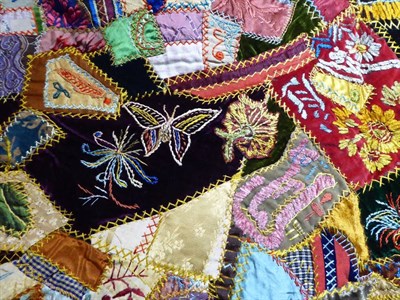 Lot 2003 - Victorian Panel of Crazy Patchwork, incorporating coloured and patterned silks, velvets, the...
