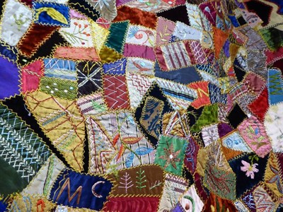 Lot 2003 - Victorian Panel of Crazy Patchwork, incorporating coloured and patterned silks, velvets, the...