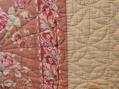 Lot 2016 - Large Early 20th Century Reversible Cotton Quilt, comprising a cream centre with rose quilting,...