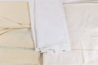 Lot 2018 - A French Cream Linen Bed Sheet, embroidered with floral motifs and initialled 'M.G.' stamped Agalys