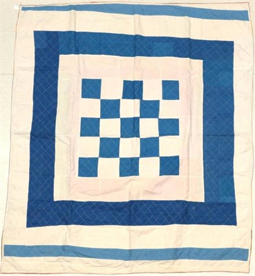 Lot 2021 - Early 20th Century Large Blue and White Reversible Patchwork Quilt, with central design of...